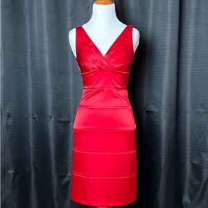 B. Darlin red satin dress from Dillard’s.  Size: 3/4 from Juniors Department.